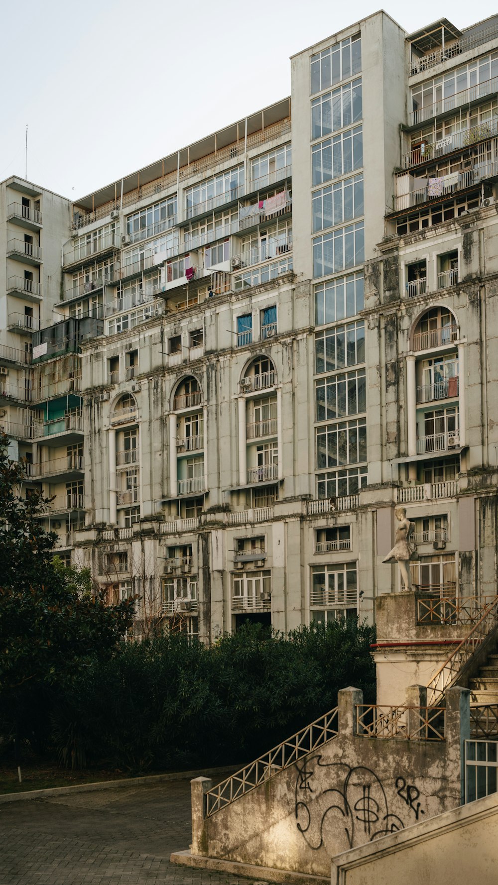 an old building with graffiti on the side of it