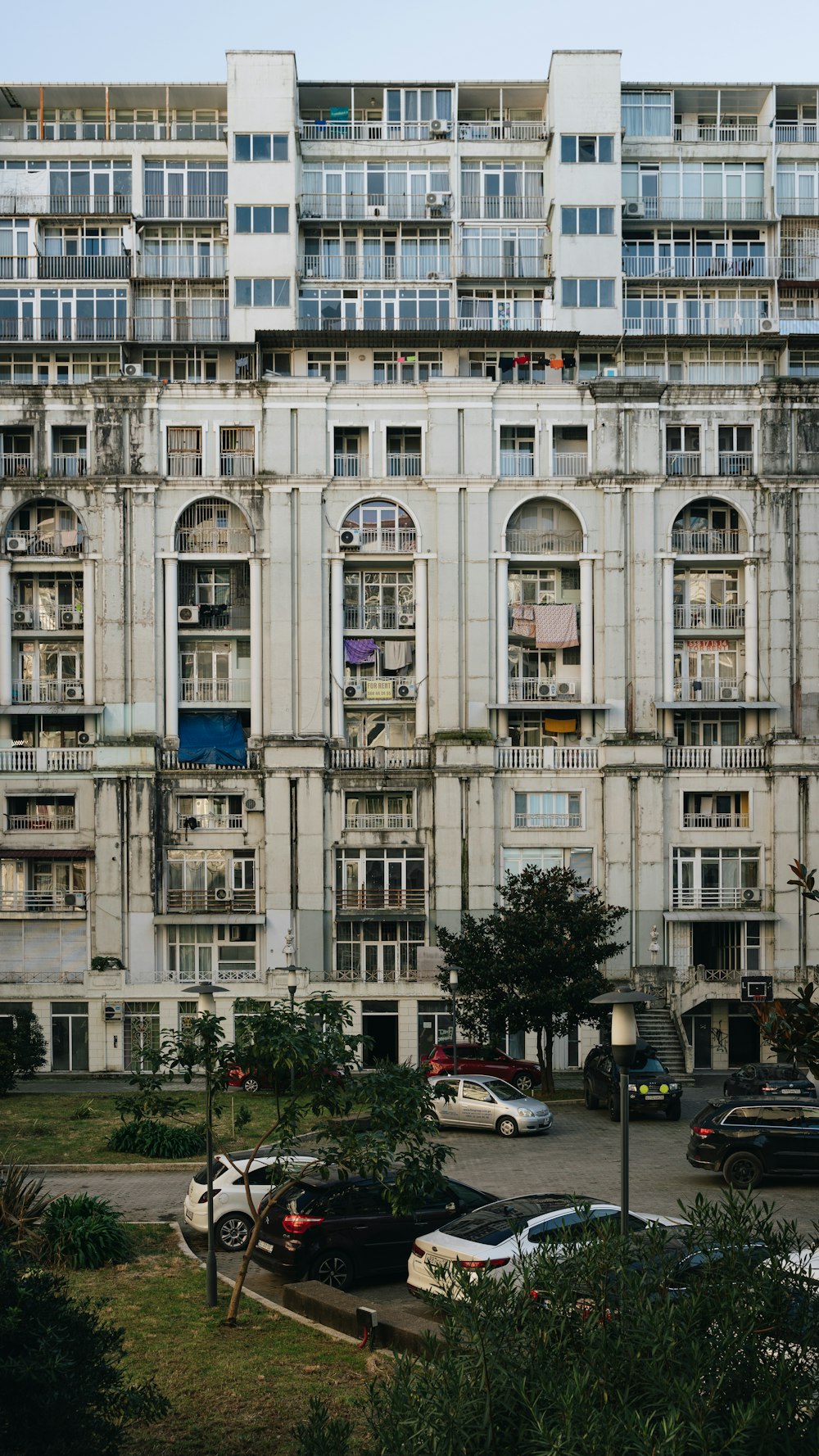 a large building with many windows and balconies