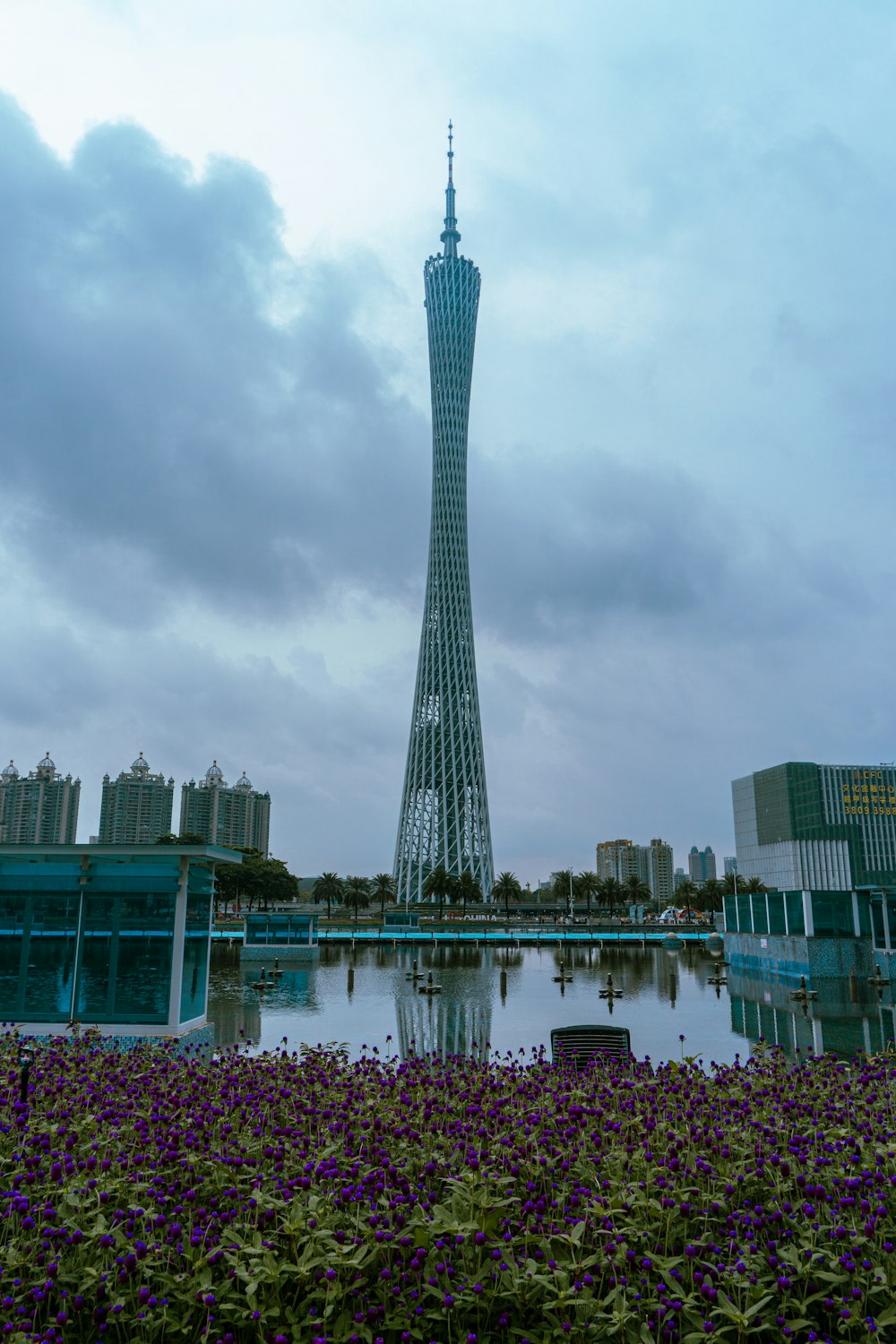 a very tall tower with a very tall tower in the background