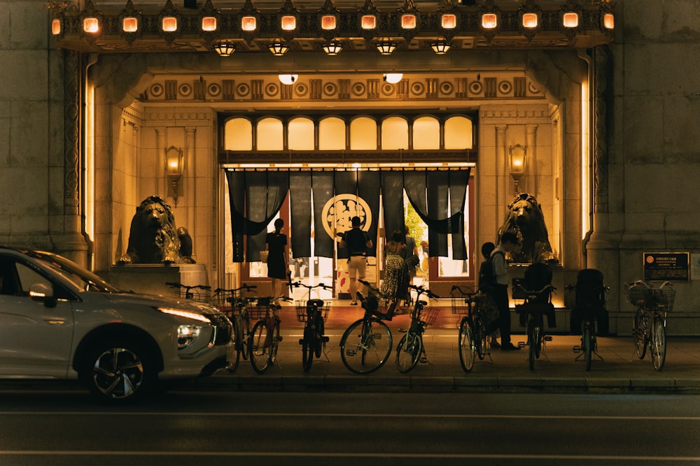 a group of people standing in front of a building