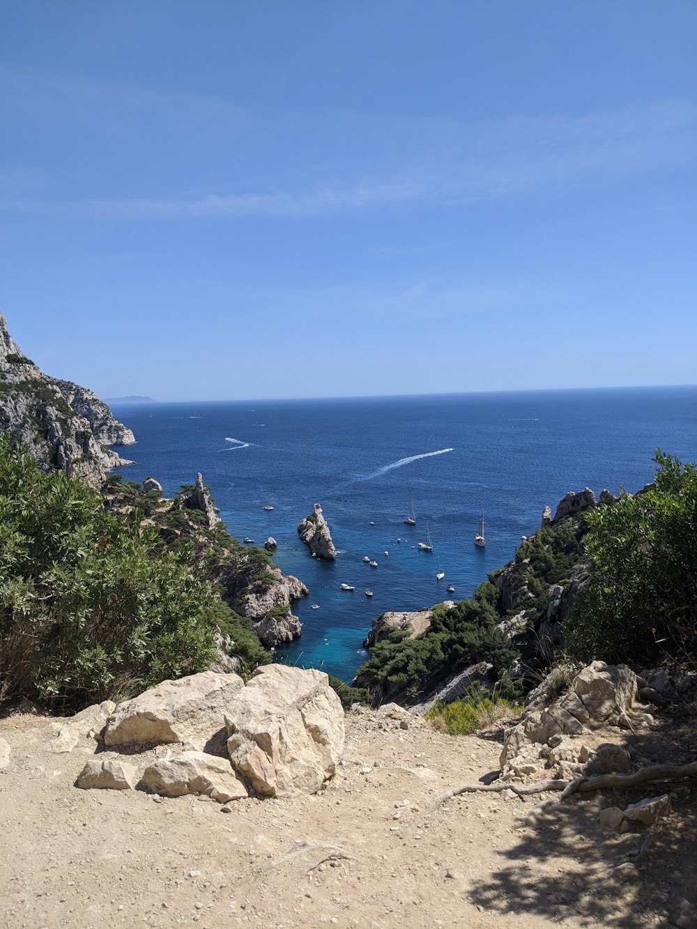 a view of a body of water from a cliff