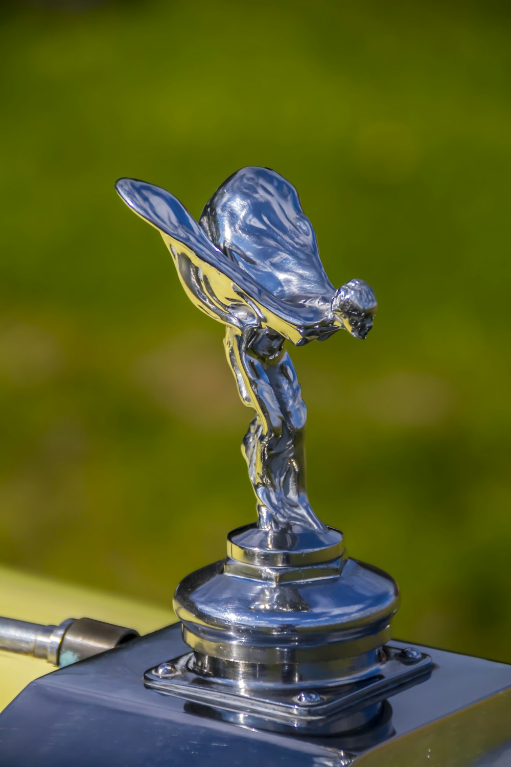 the hood ornament of a vintage car