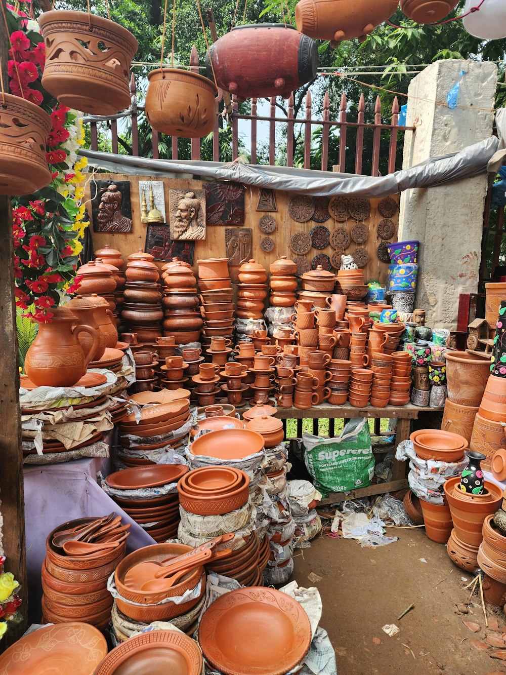 a group of clay pots sitting on top of a table
