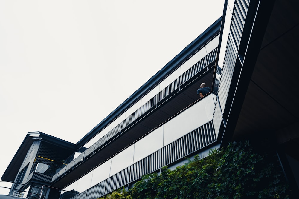 a man climbing up the side of a building