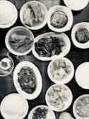 A colorful spread of traditional Chinese comfort food on a dining table.