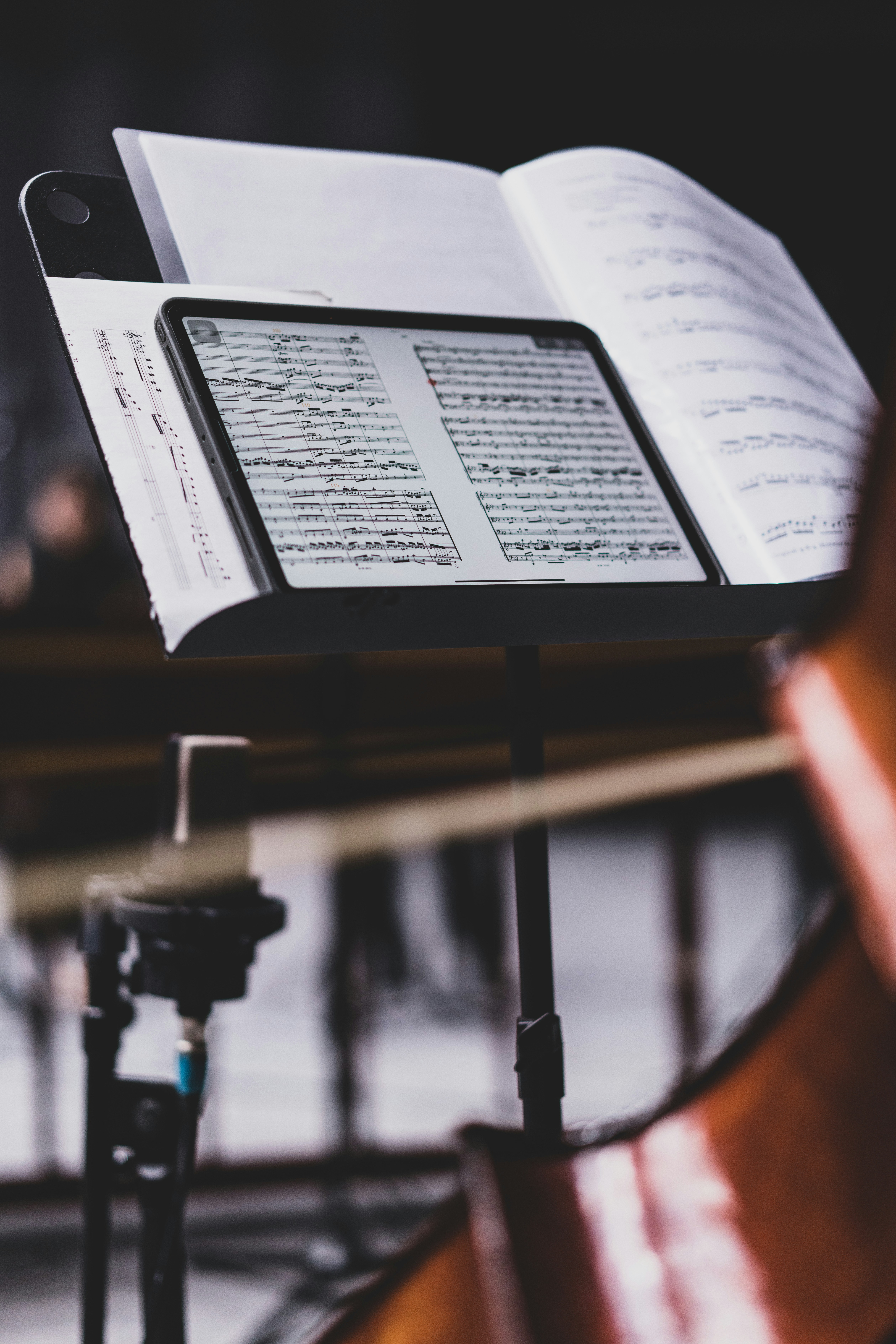 an open book sitting on top of a wooden bench