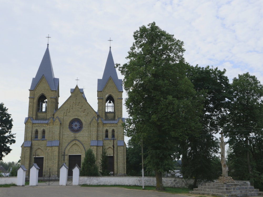 a church with a clock on the front of it