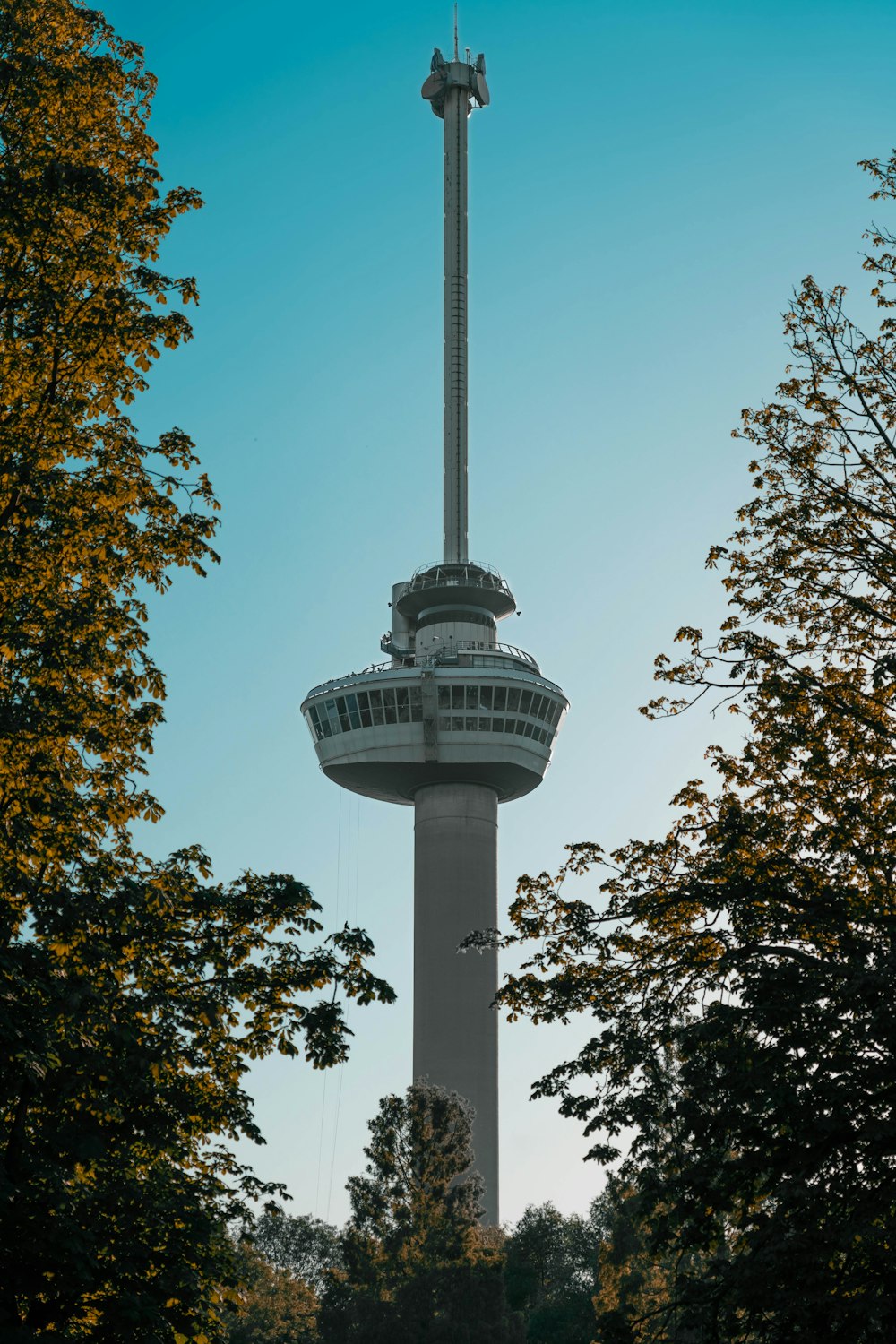 a tall tower with a clock on top of it