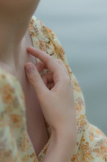 a close up of a person holding a cell phone