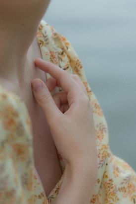 a close up of a person holding a cell phone
