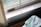 Close-up of clean HVAC vents with sunlight streaming through a window.