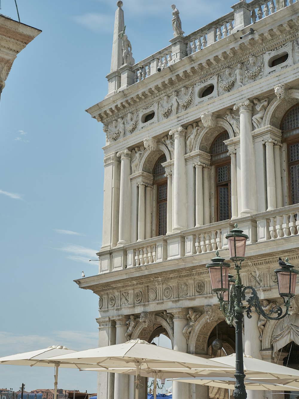 a tall building with a clock on the side of it