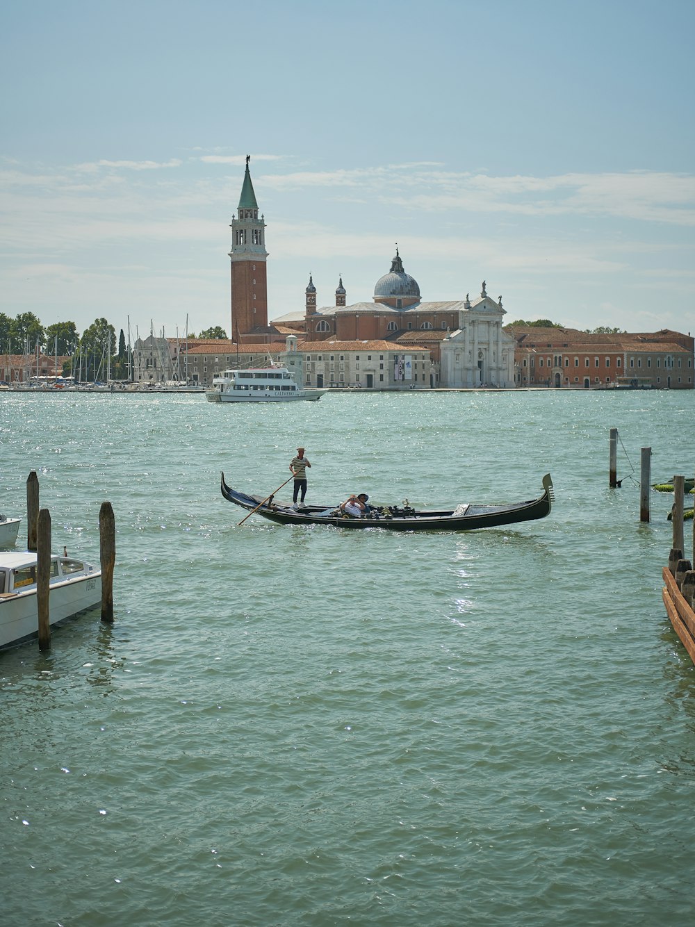 a gondola in the middle of a large body of water