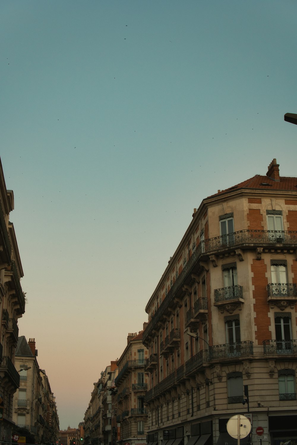 a city street filled with lots of tall buildings