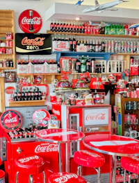 Vintage Coca-Cola collectibles including bottles and branded memorabilia.