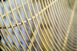 Close-up photo of a finely crafted metal filter cage used in flour mills.