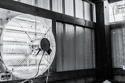 Image of a Soler & Palau extraction fan mounted on an industrial wall.