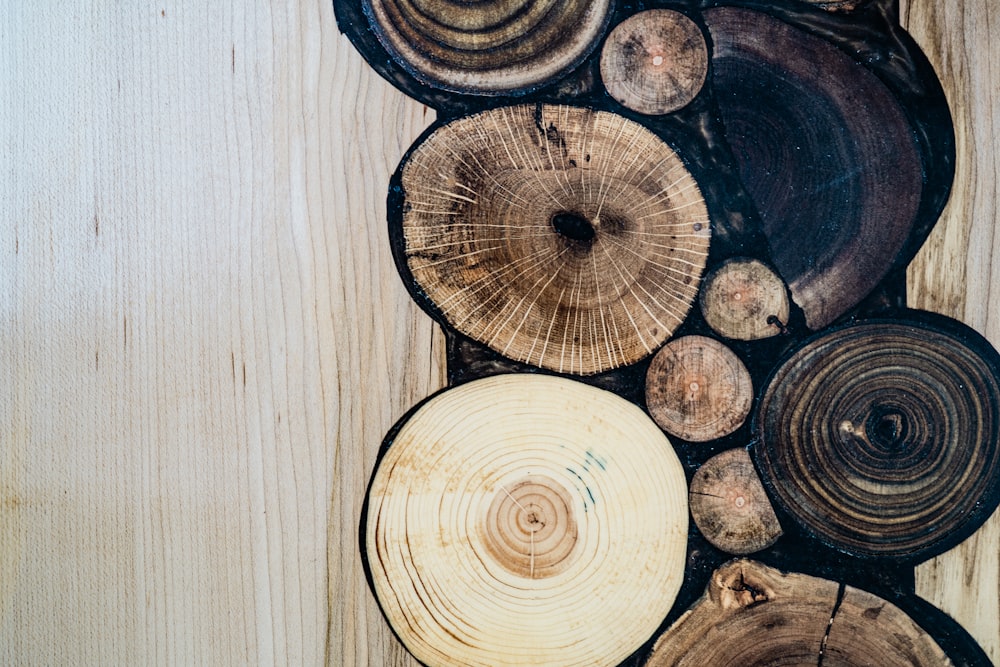 a group of wood logs stacked on top of each other