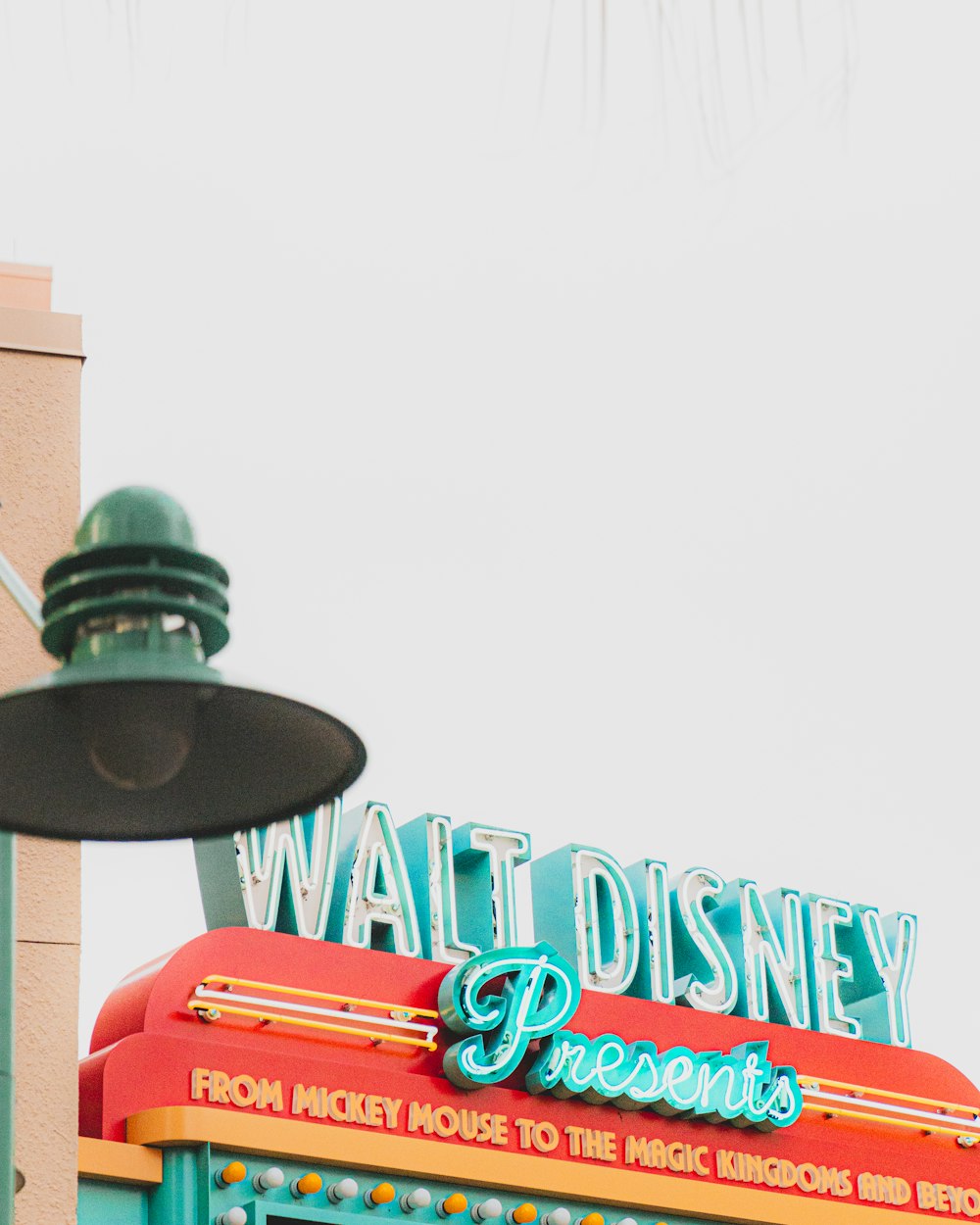 a sign for a restaurant called walt disney