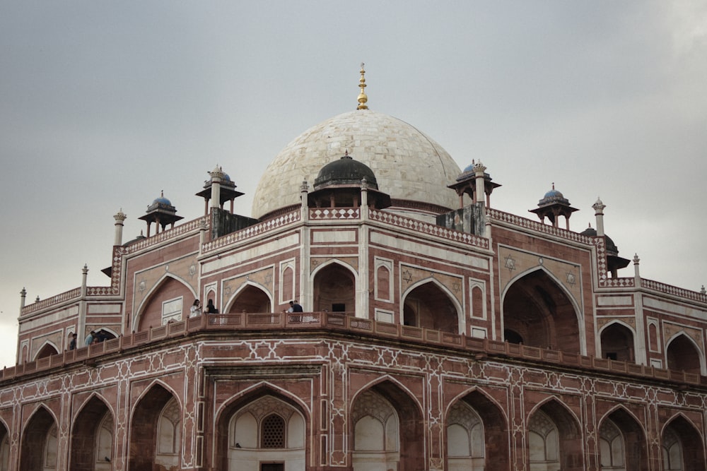 a large building with a white dome on top