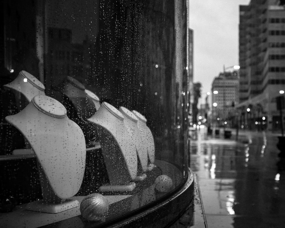 a black and white photo of a window display