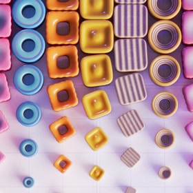 An array of colorful 3D printed items arranged artistically.