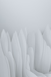 A minimalist art piece featuring soft pastel tones and gentle flowing shapes that evoke tranquility.