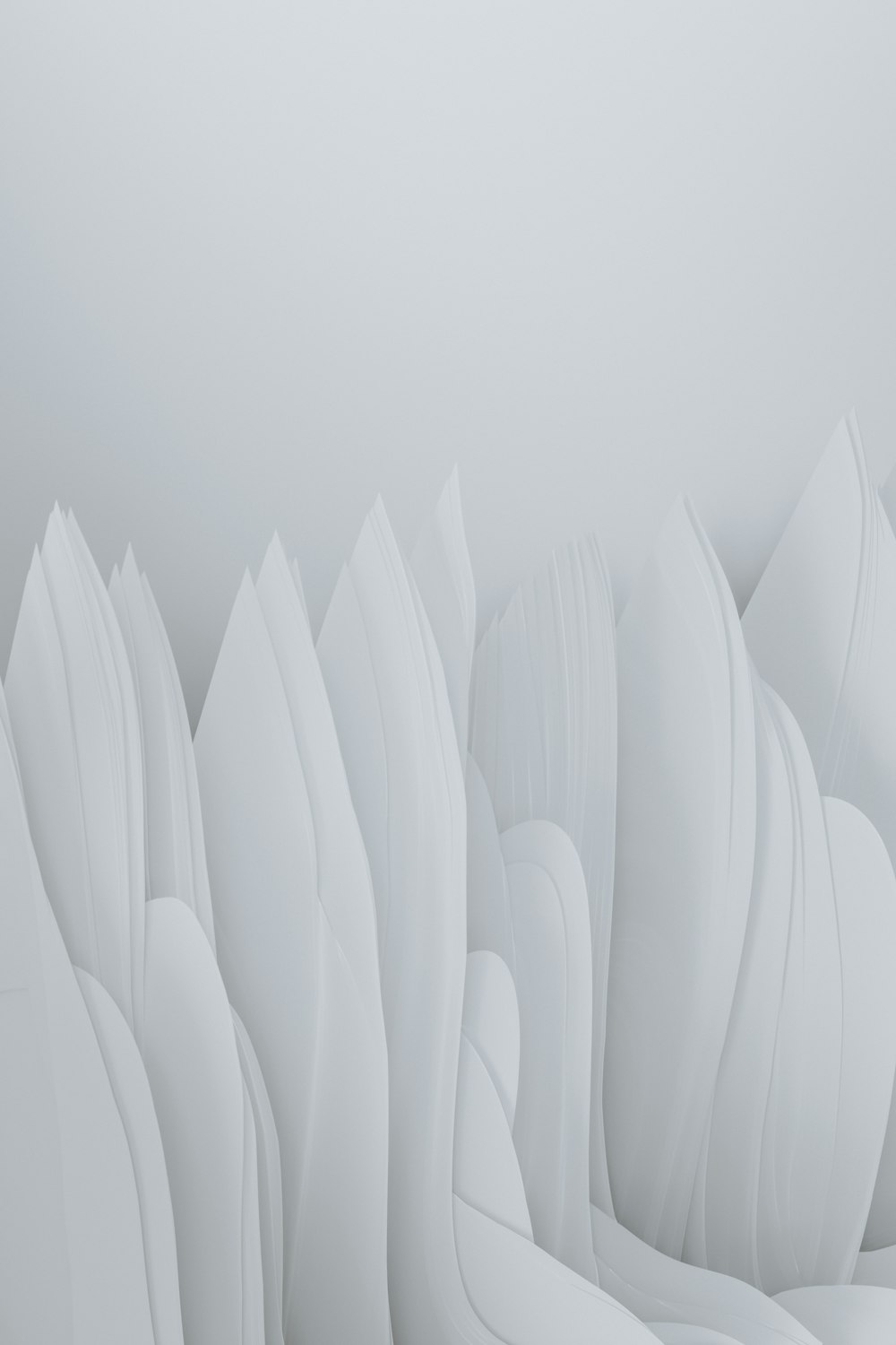 an abstract white background with a lot of wavy shapes