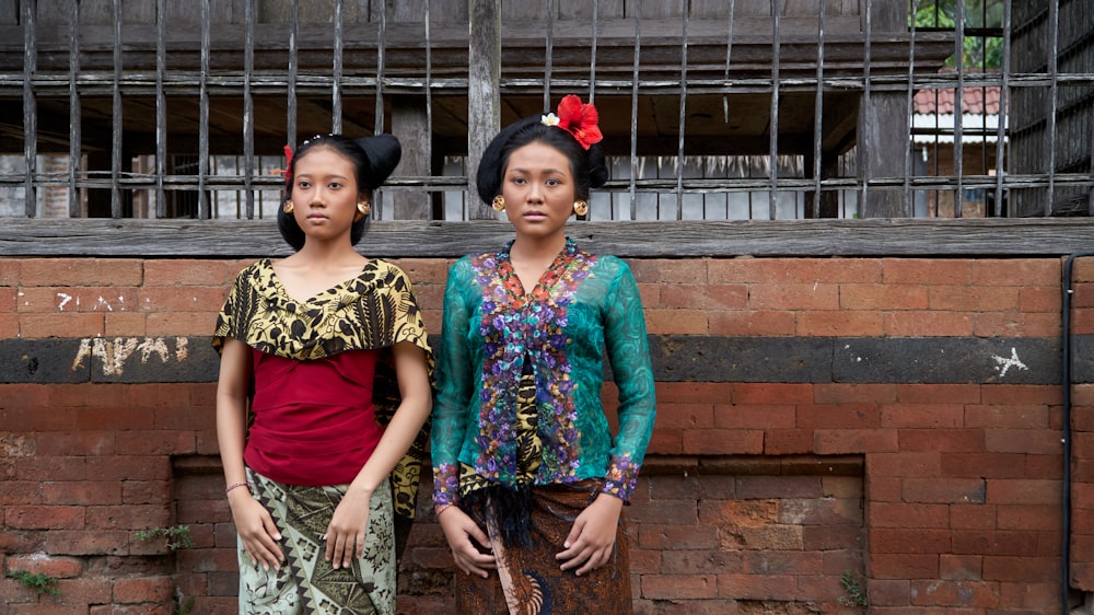 a couple of women standing next to each other