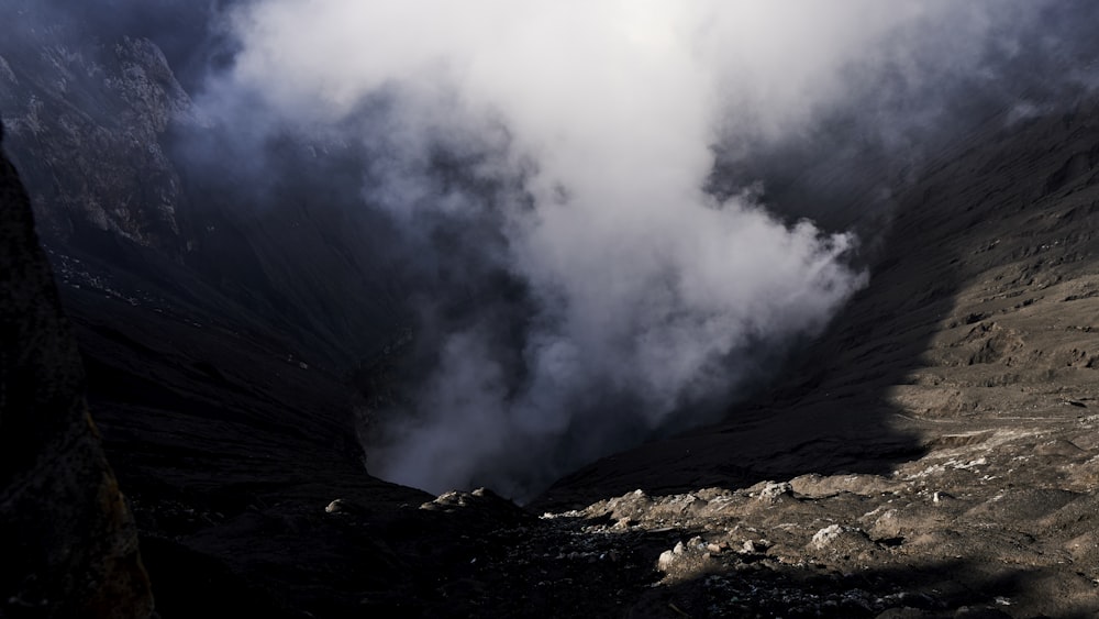 a view of a mountain with a lot of smoke coming out of it