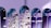 Several test tubes are arranged in a row, reflecting computer code projected onto them. The text appears distorted and split across the test tubes, creating an abstract and futuristic visual effect.