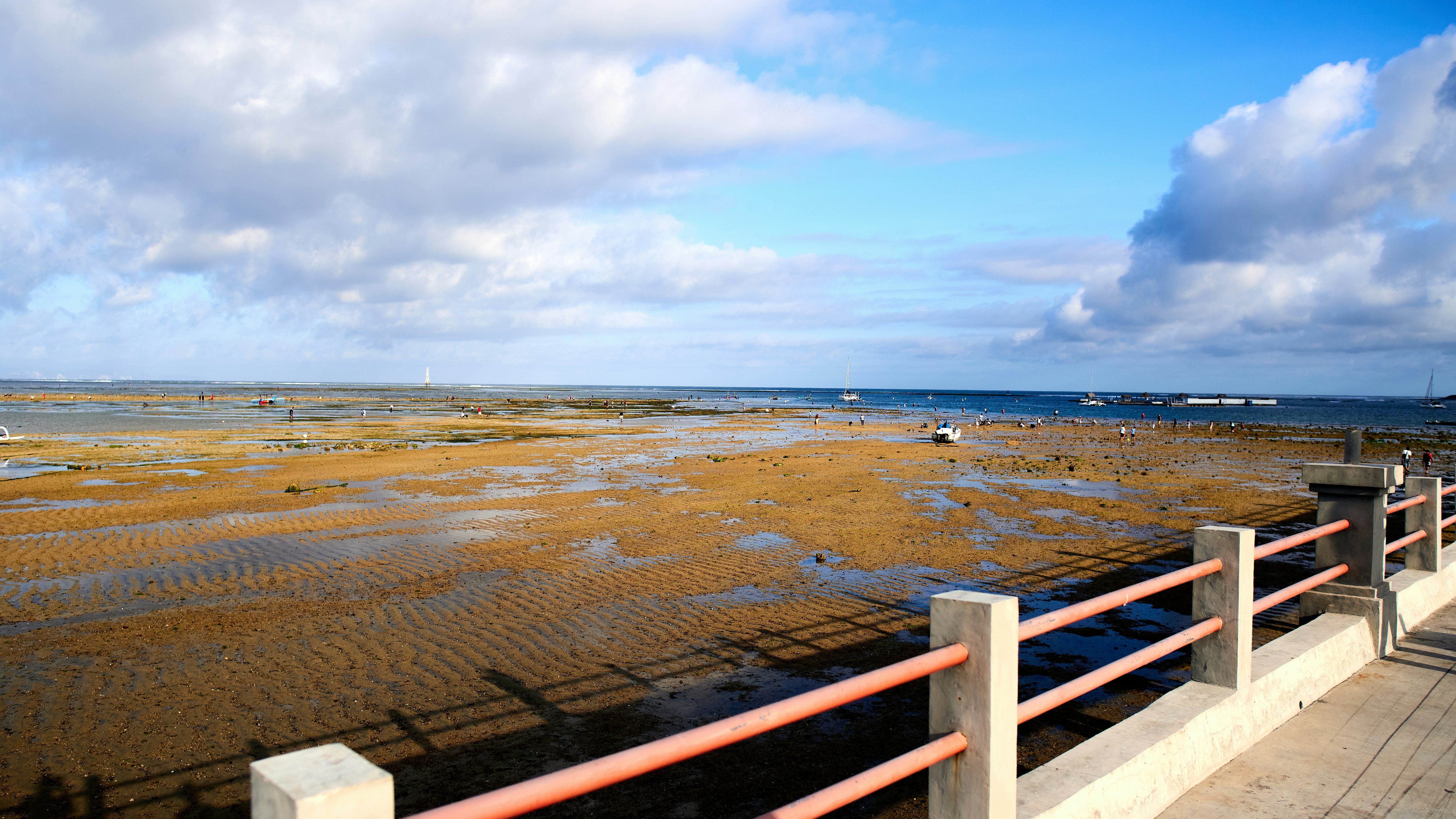 a view of a body of water from a bridge