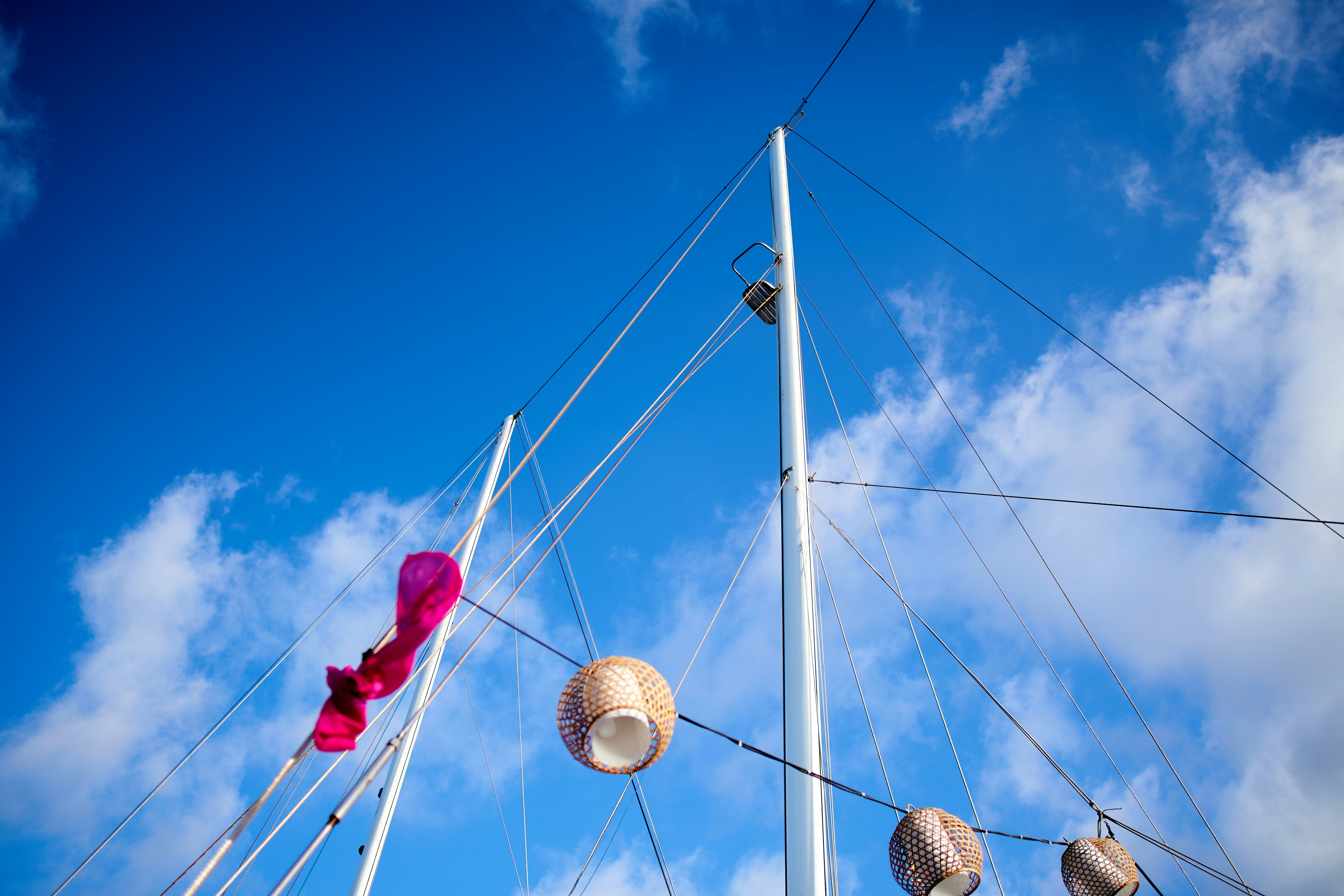 a bunch of balls hanging from the side of a boat