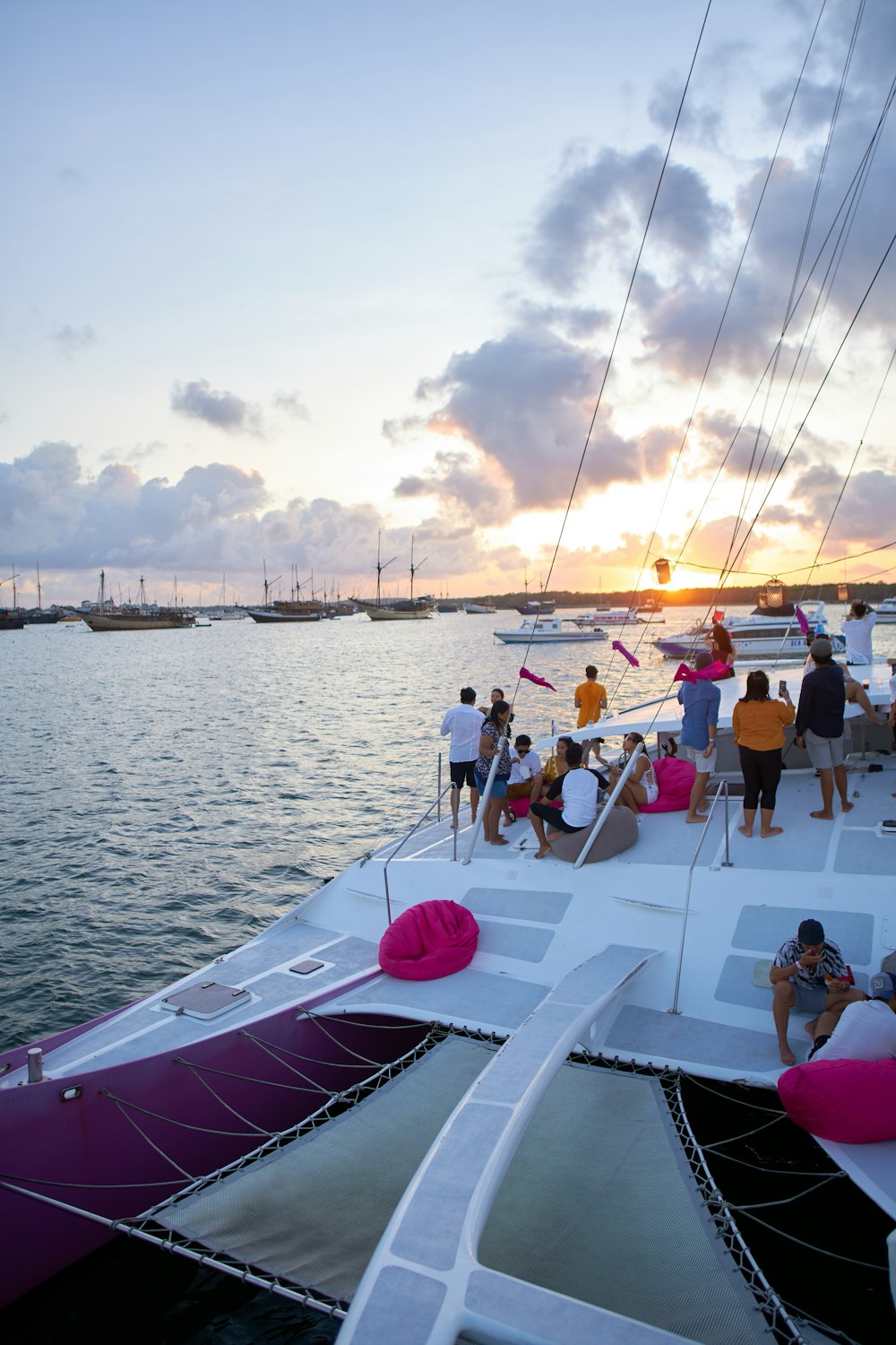 a group of people sitting on top of a boat