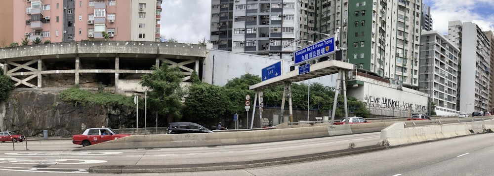 a city street with a bunch of tall buildings