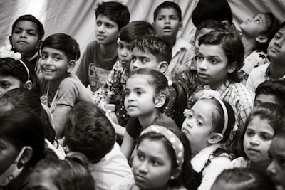 A group of kids engaged in a science experiment, showcasing teamwork and curiosity.