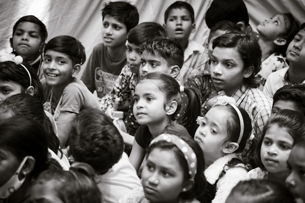 Children gathered around a storyteller during a Sunday school session, eyes bright with wonder.
