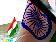 Close-up of the Tiranga Jhanda flag with intricate details.