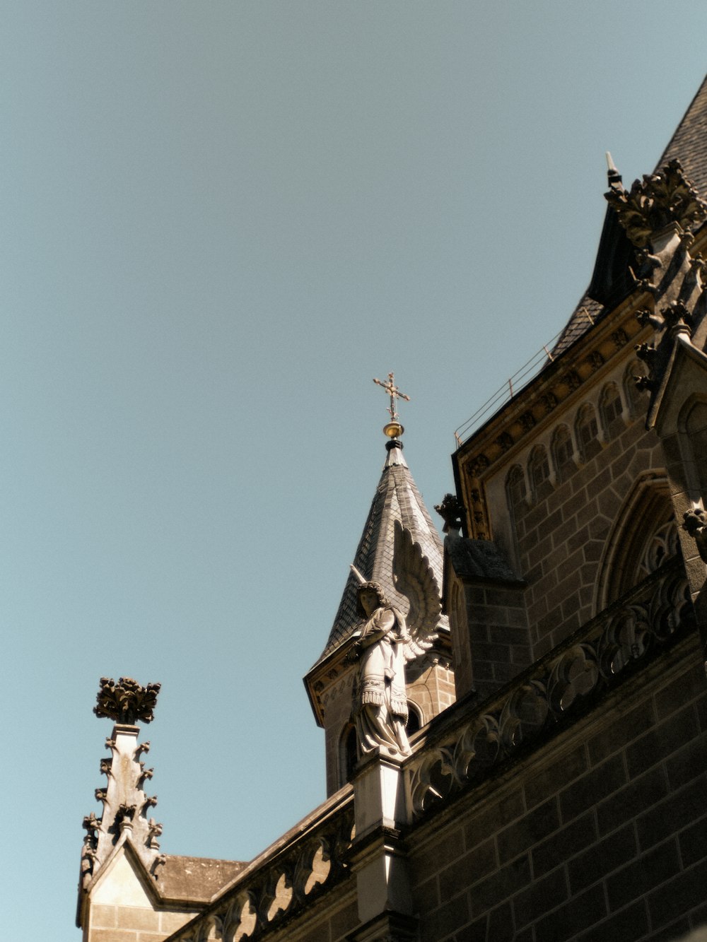 a church steeple with a cross on top