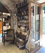 A cozy antique shop corner filled with vintage clocks, old books, and rustic wooden furniture.