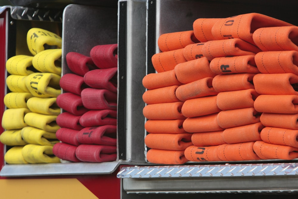 a firetruck with fire hoses stacked on top of each other