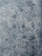 A close-up of a brain-teaser puzzle with intricate, interlocking pieces.