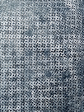 A close-up of a brain-teaser puzzle with intricate, interlocking pieces.