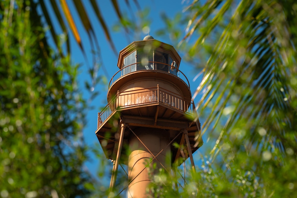 a tall tower with a clock on the top of it