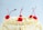 Close-up of a beautifully decorated cake on a wooden table.