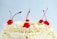 A close-up of a beautifully decorated cake with vibrant colors and intricate designs.