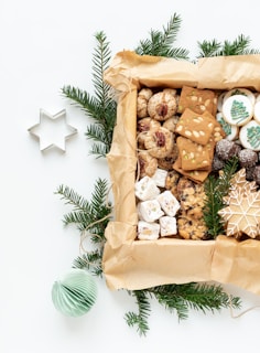a box filled with cookies and cookies on top of a table