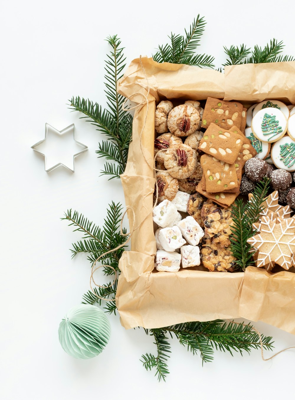 a box filled with cookies and cookies on top of a table