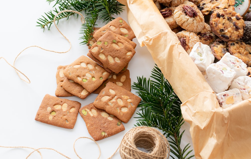 a table topped with cookies and other treats