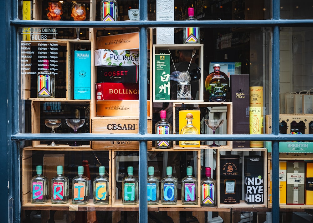 a window display of liquor bottles in a store